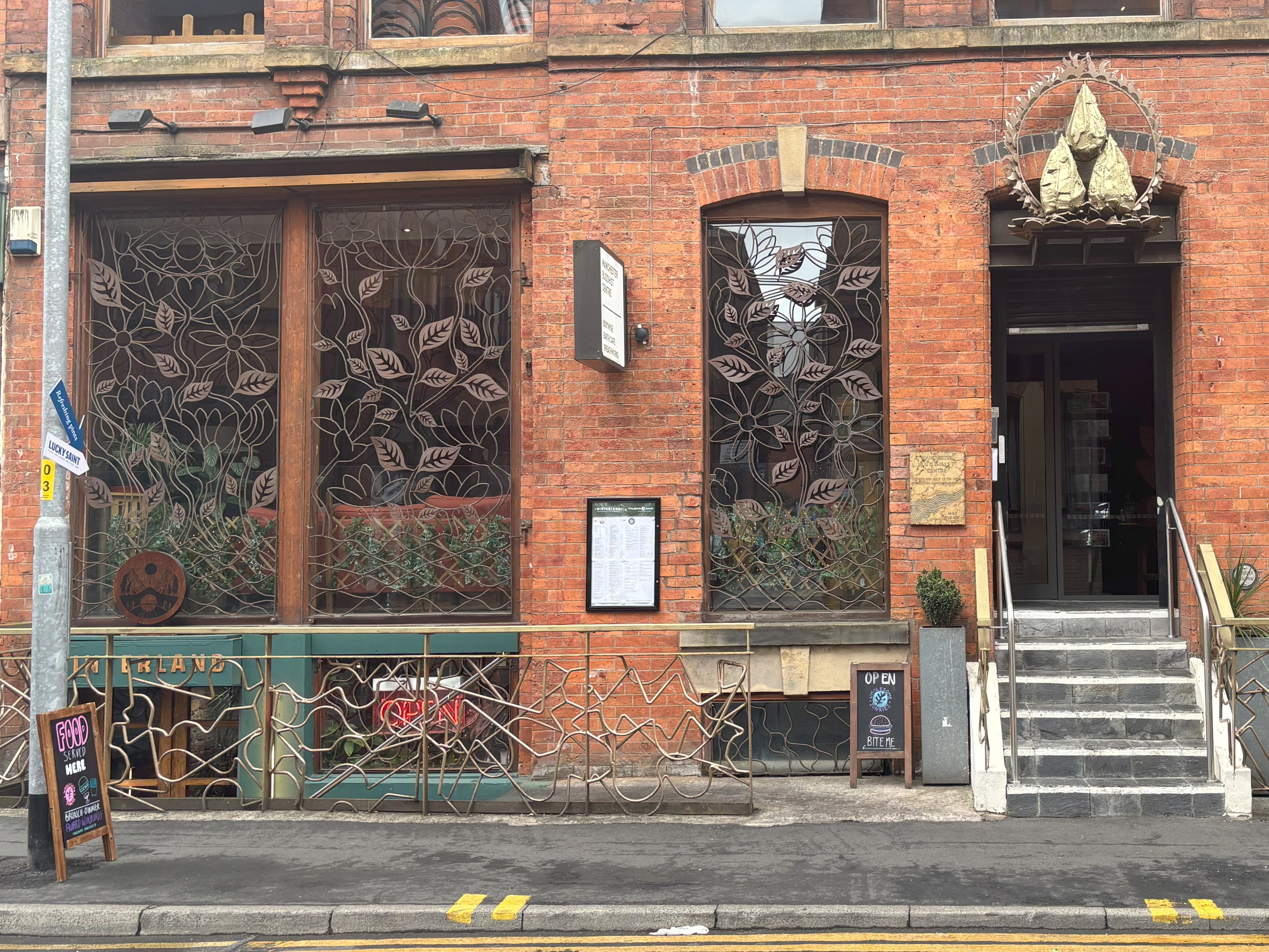 Two restaurant front of Wholesome Junkies vegan restaurant in Northern Quarter in Manchester.